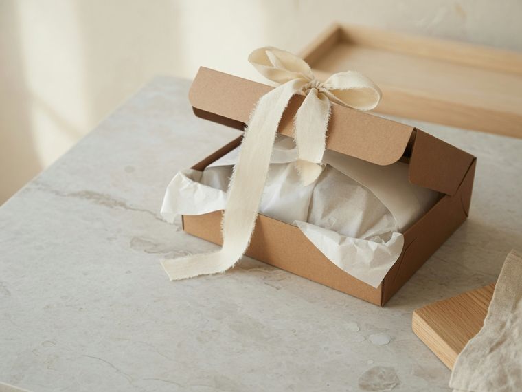 A box with a ribbon, ready to deliver